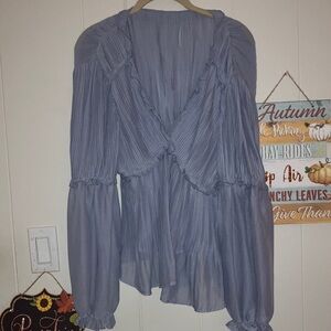 Beautiful periwinkle blue sheer peplum top